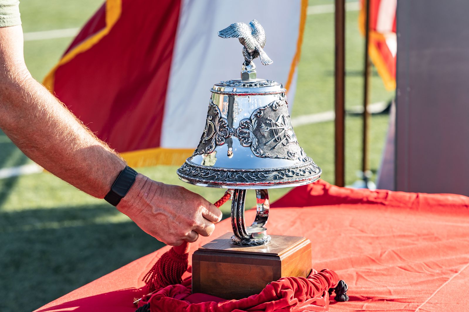 Memorial bell on a red table